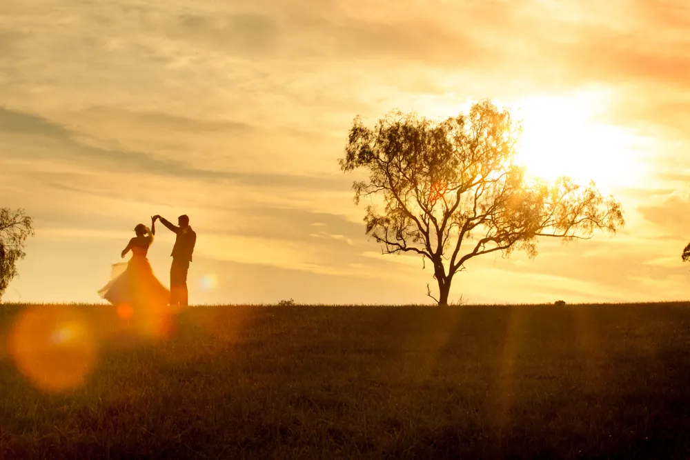 A wedding couple dancing outdoors at Lilydale Estate, 9Dorf Farms.